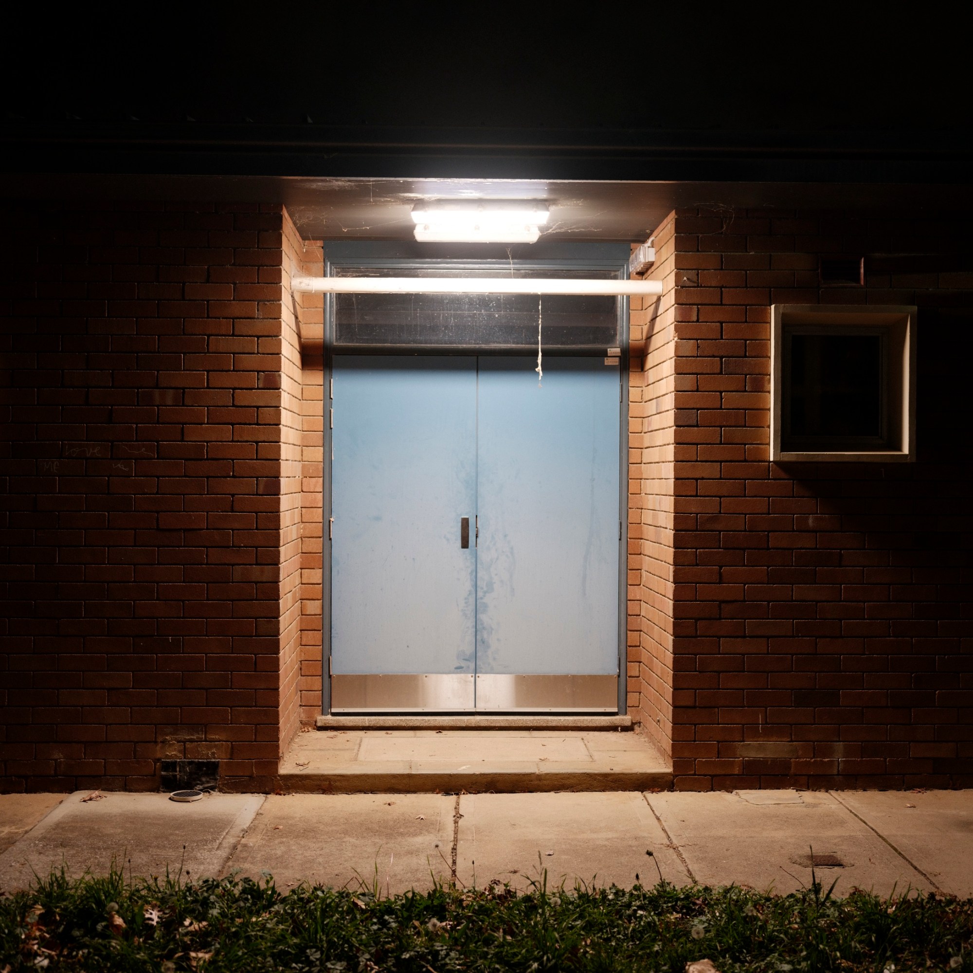 Schoolhouse door at night